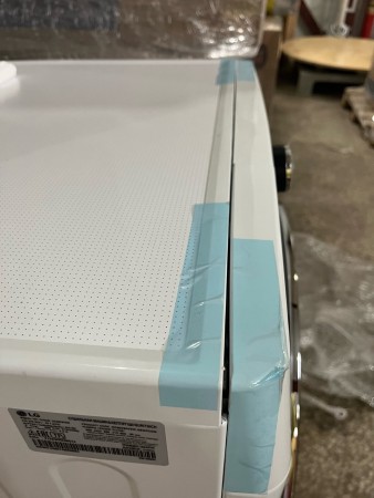сушильная машина lg dc90v9v9w inverter, небольшое повреждение в верхней части