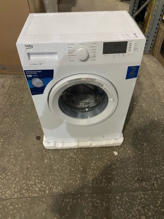 стиральная машина beko wre 6512 bww, замятие с низу на лицевой стороне, скол краски