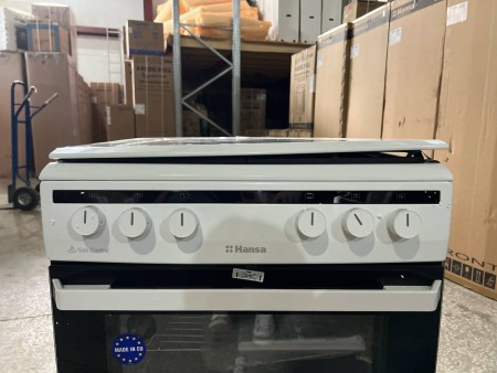 газоэлектрическая плита hansa fcmw 680250, вмятины на корпусе,снизу отходит ,крышка кривая