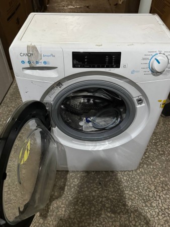 стиральная машина candy cso34 106tb1/2-07 smart pro steam исправна, потертости и царапины корпуса